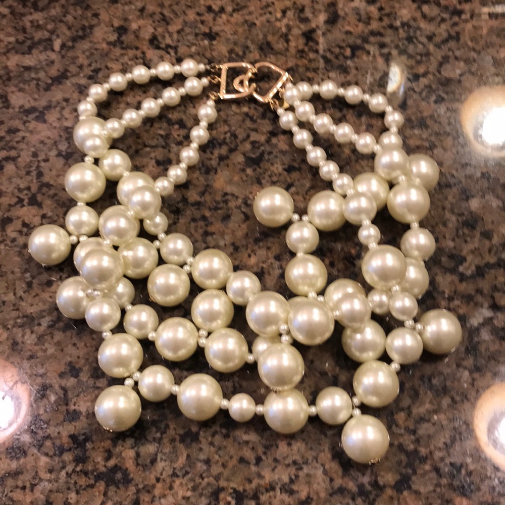 Multi strand off white necklace